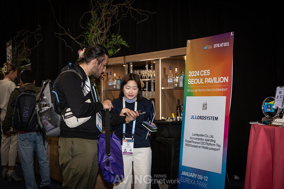 Representatives from LordSystem showcasing Trip.PASS to visitors at CES 2024 | Photo by AVING News
