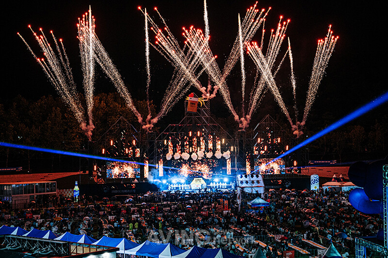 Opening ceremony crowd at the 2023 Daegu Chimac Festival at Duryu Park, with stage and city banners visible